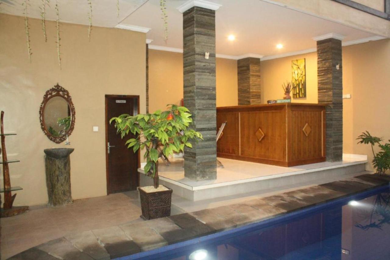 Oyo Flagship 91237 Ratu Guest House Kedunganan Esterno foto