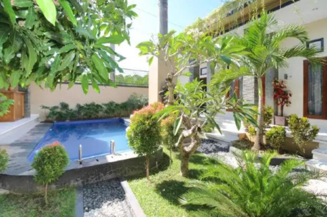 Oyo Flagship 91237 Ratu Guest House Kedunganan Esterno foto