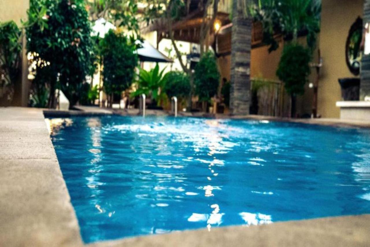 Oyo Flagship 91237 Ratu Guest House Kedunganan Esterno foto
