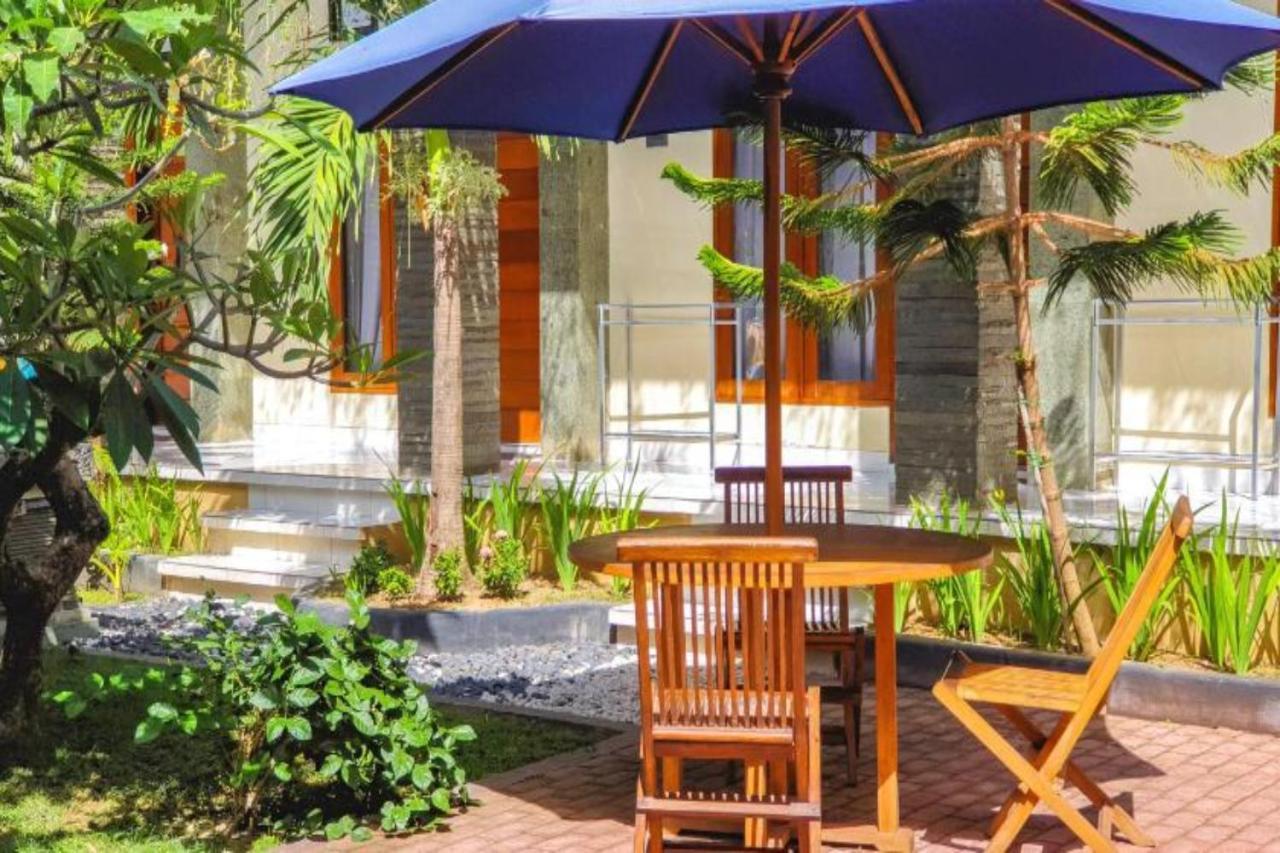 Oyo Flagship 91237 Ratu Guest House Kedunganan Esterno foto