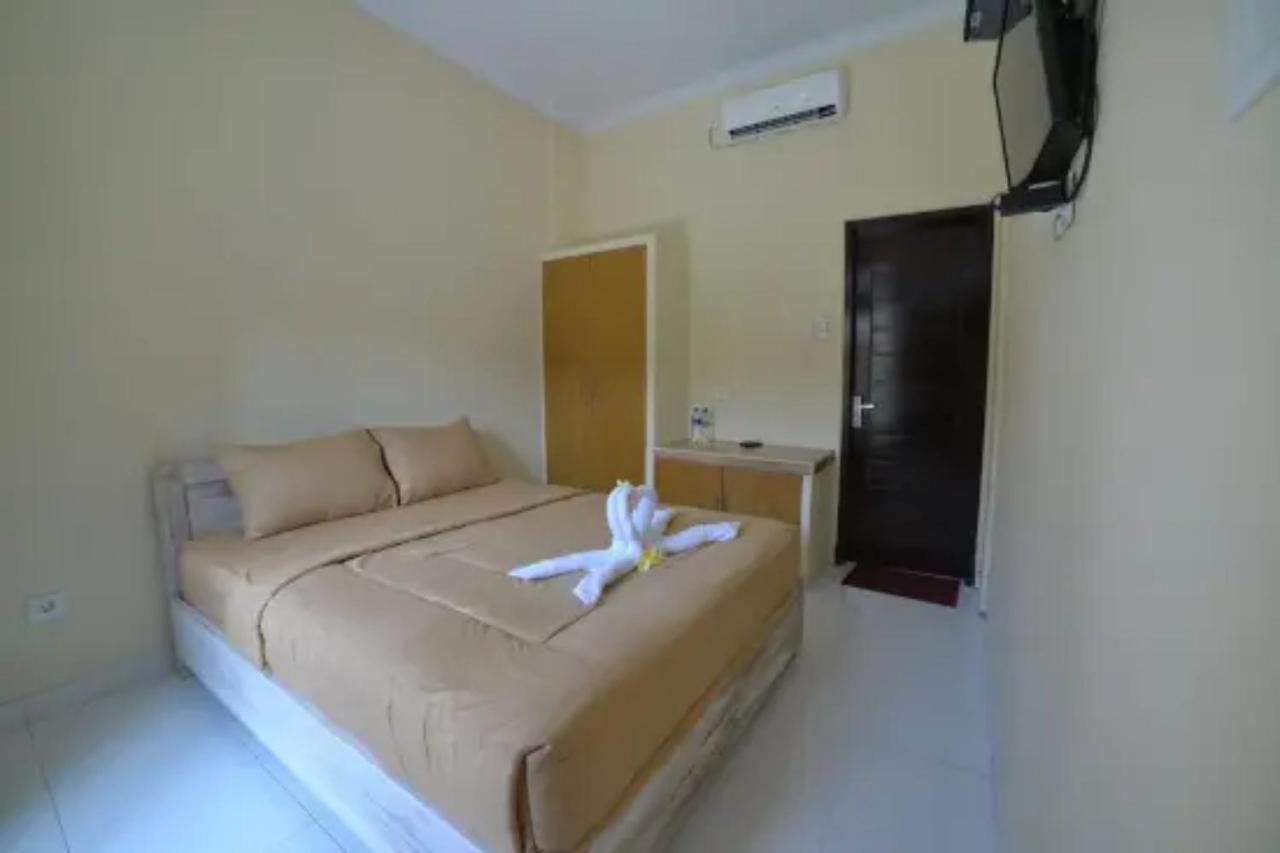 Oyo Flagship 91237 Ratu Guest House Kedunganan Esterno foto