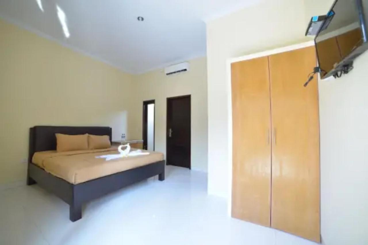 Oyo Flagship 91237 Ratu Guest House Kedunganan Esterno foto