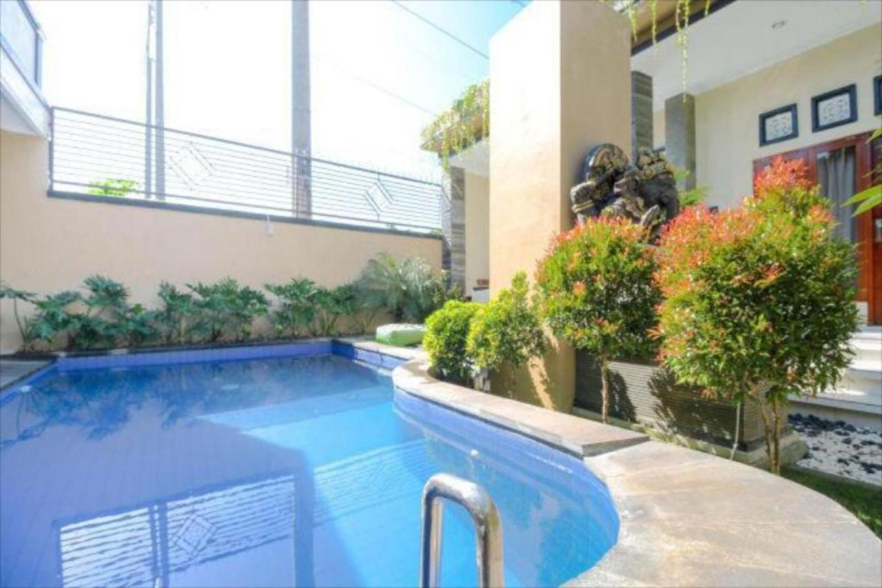 Oyo Flagship 91237 Ratu Guest House Kedunganan Esterno foto