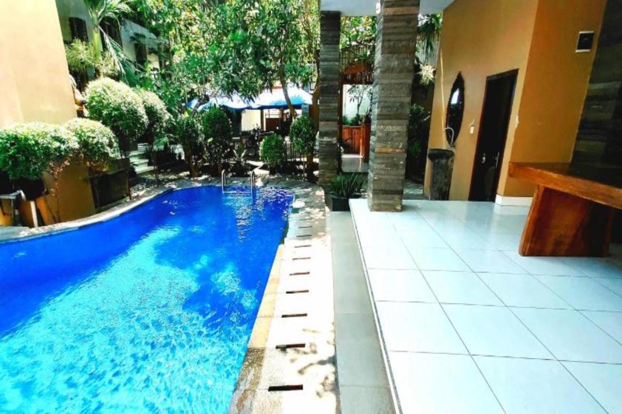 Oyo Flagship 91237 Ratu Guest House Kedunganan Esterno foto